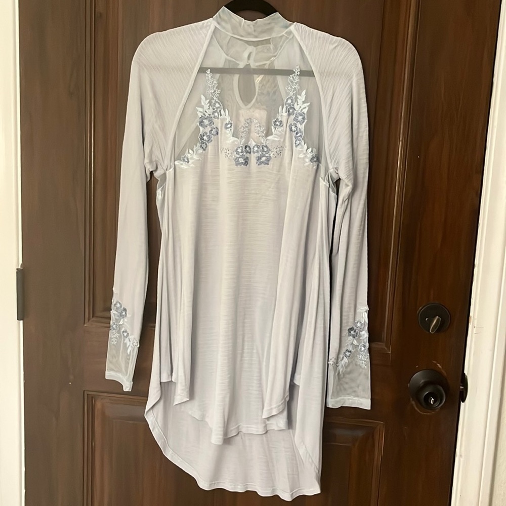 New with tags Free People shirt/mini dress with mesh and embroidery details.